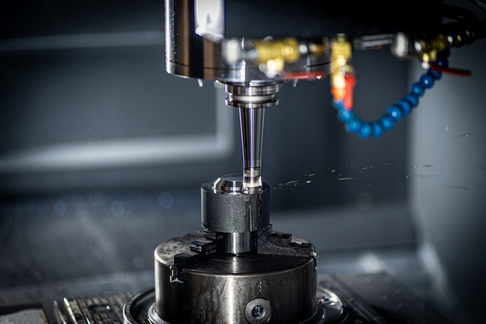CNC machined component on the workshop bench