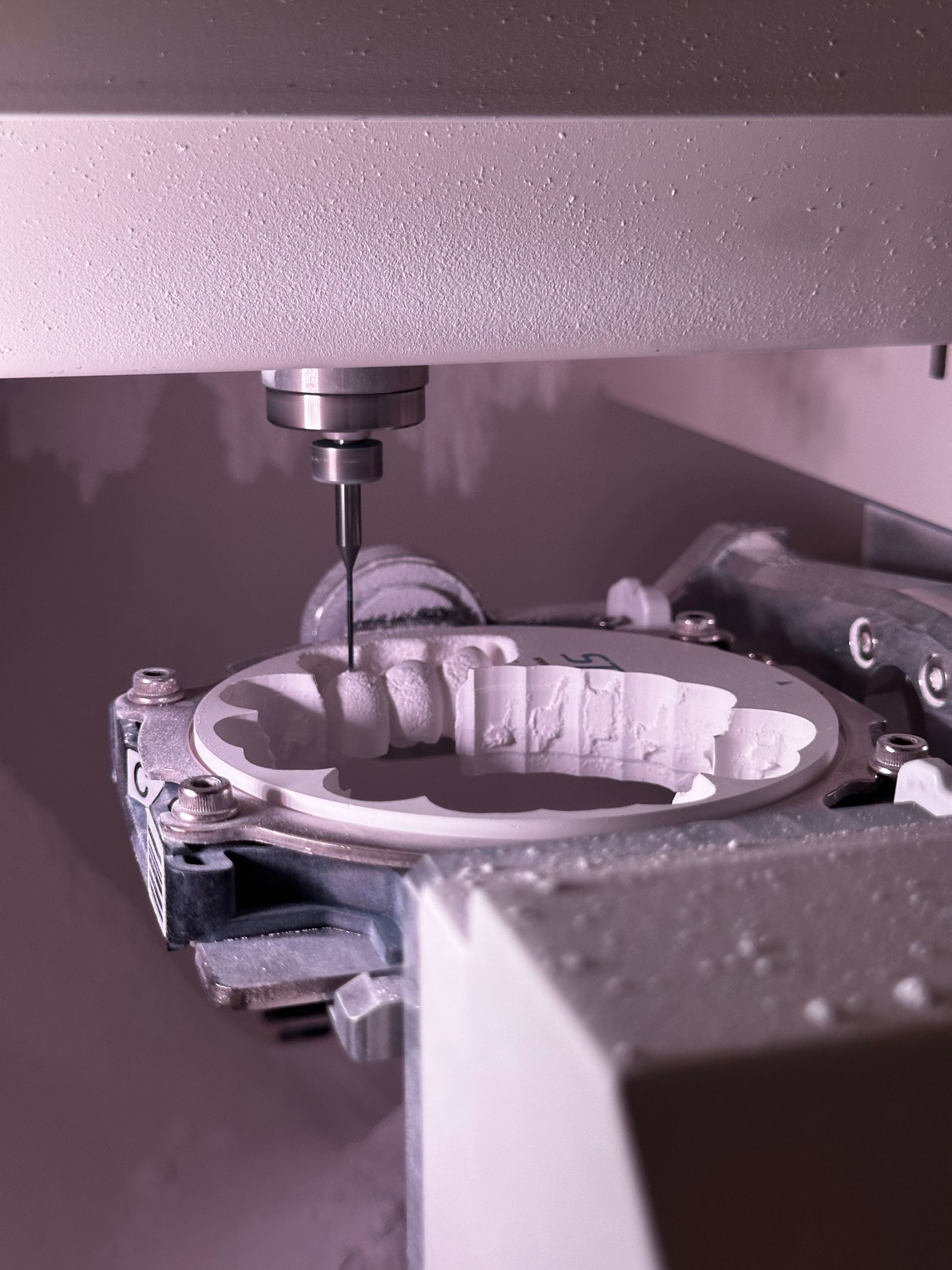 CNC machined component on the workshop bench
